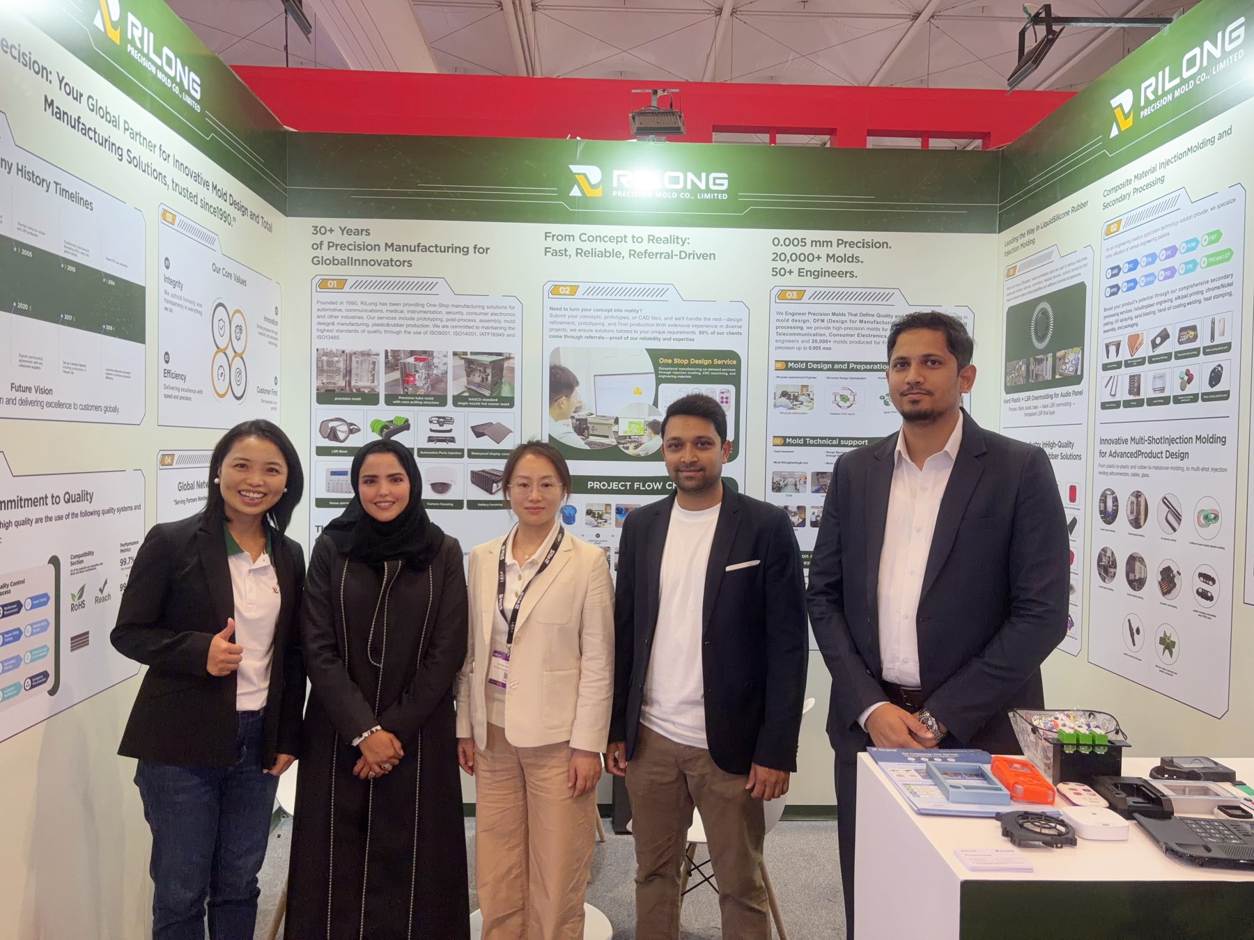 Rilong team members and visitors posing together at the LEAP 2026 booth
